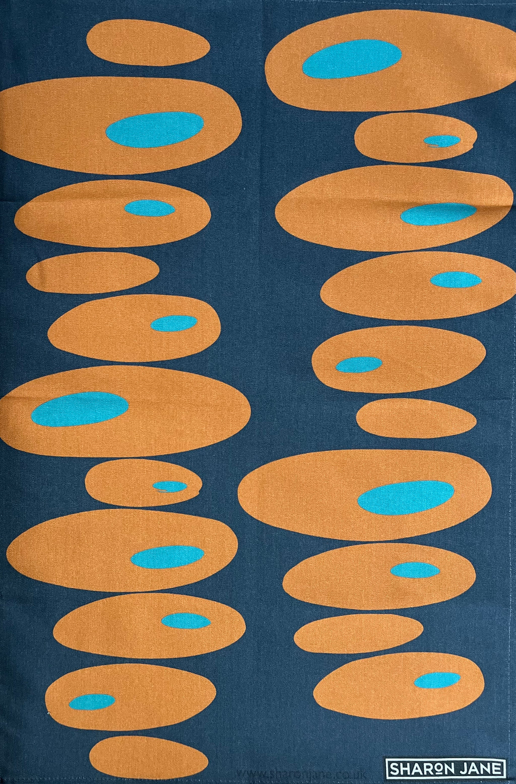 Pebbles Tea Towel - Navy + Orange