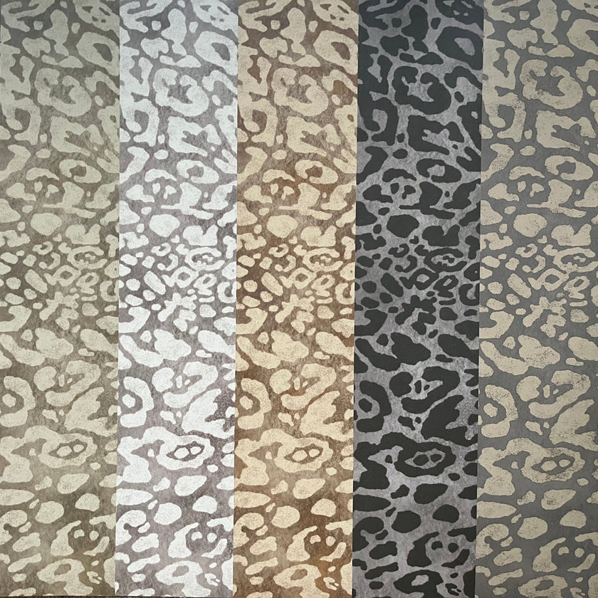 Striped pattern with alternating dark and light gray, beige, and brown colors.