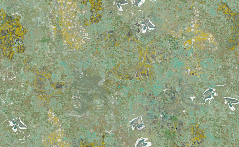 Textured green surface with floral patterns and metallic accents