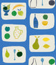 A section of wallpaper with a tile effect design featuring naive fruit illustrations such as bananas, apples, and pears in a blue background.