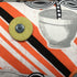Appliquéd Chevron Orange + Black Cherry Cushion