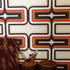 11 metres Lina - 70s Geometric wallpaper Terracotta  + Orange